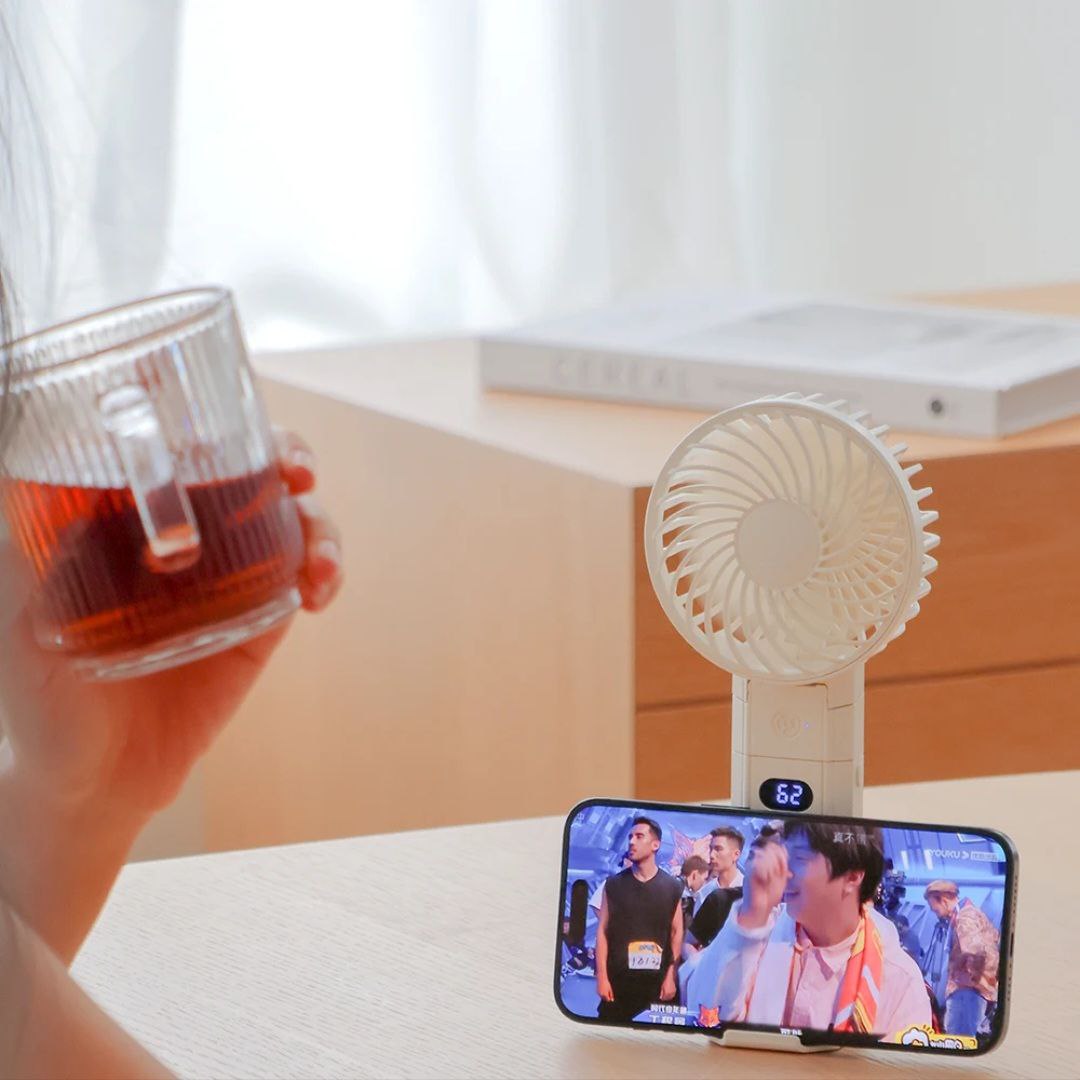 Rechargeable Handheld Fan with Power Bank – Stay Cool & Charged Anywhere